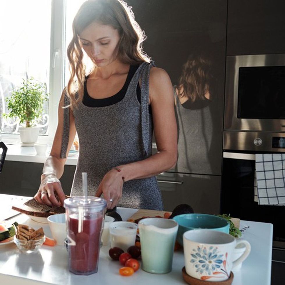 Stocksy woman food prep Clique Images