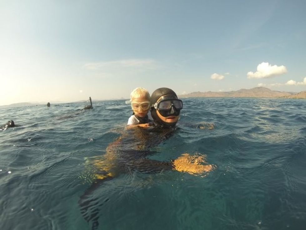 STUNNING video footage what could be the worldís youngest freediver learning his trade without any air supply from the age of TWO. The video and pictures shows the young boy, who has been training since the age of two, hold onto his dadís back as he dives under the surface of the water before he emerges for air twenty seconds later. The incredible footage also shows the kid, called Fedor who is the son of a pro-freediver repeating the trick on his mumís back as she swims underwater and aged three, using a rope to pull himself deep underwater before rising back above the surface when he can no longer hold his breath. The video was taken by professional freediver Alexey Molchanov (29) from Moscow, Russia as he was in Dahab, Blue Hole, Egypt. It shows three-year-old Fedor Afonasiev being taught how to freedive by his parents, who are friends of Alexeyís and instructors in his Freediving Federation education agency.