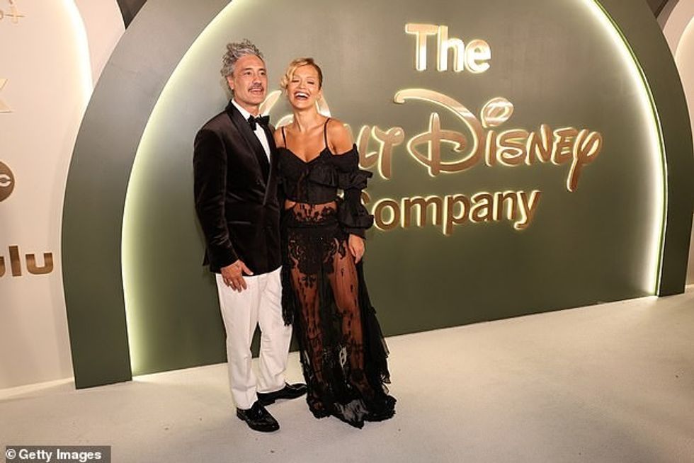 Taika, 49, looked dapper in a black velvet jacket and white pants and bow tie as he smartened up for the occasion