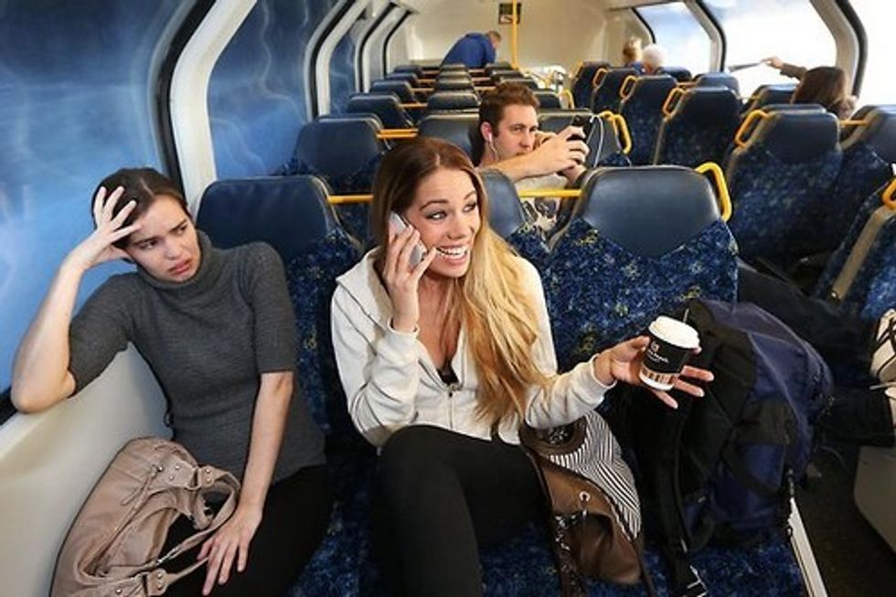 Talking loudly in public transportation