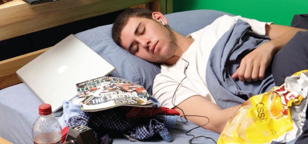 teen boy sleeping messy room