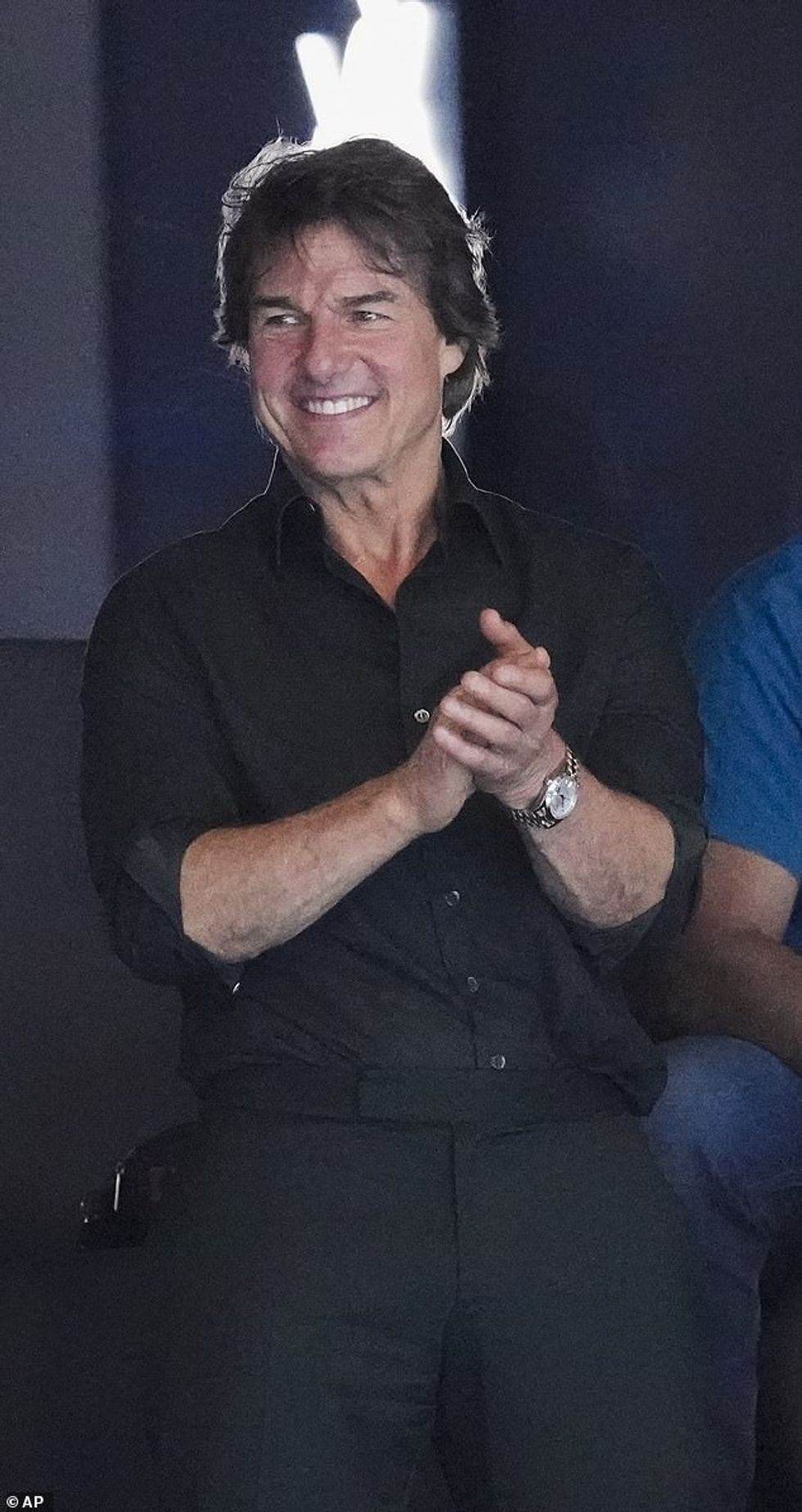 The actor, 62, put on an animated display as he clapped, punched the air and beamed as he watched the athletes compete for the gold medal