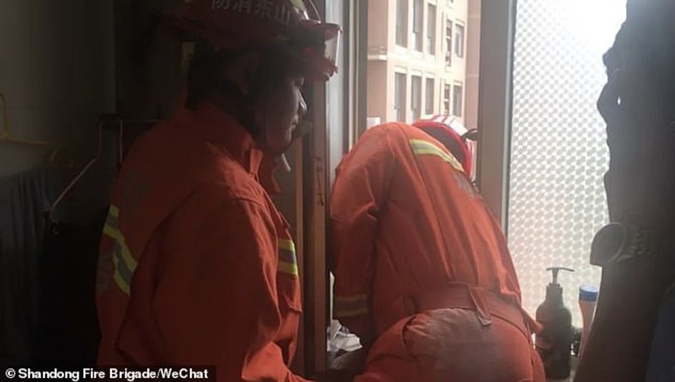 The Alzheimer¿s patient appeared to be unhurt after he was carefully lifted back inside by the rescuers. The pensioner was believed to have accidentally climbed out of his flat on July 24
