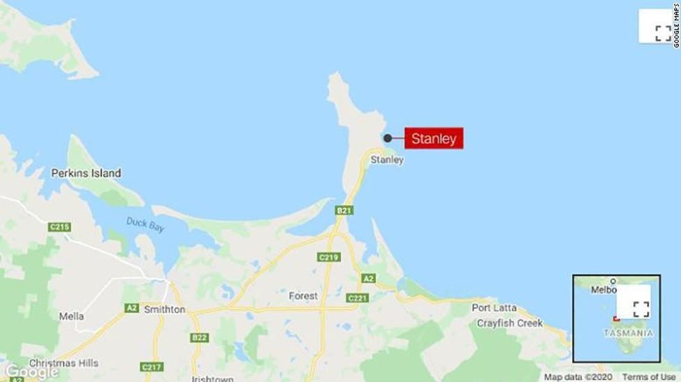 The boy was fishing with his father off the northwest coast of Tasmania when the shark struck.