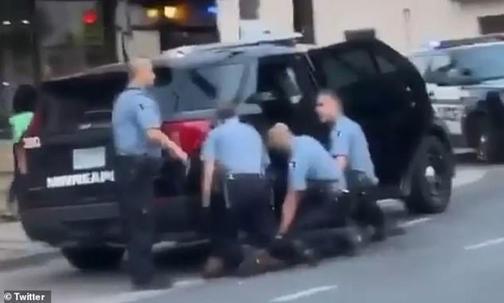 The brief clips provides a different angle than the widely publicized video that was filmed on Memorial Day, with 3 officers seen on George Floyd's back