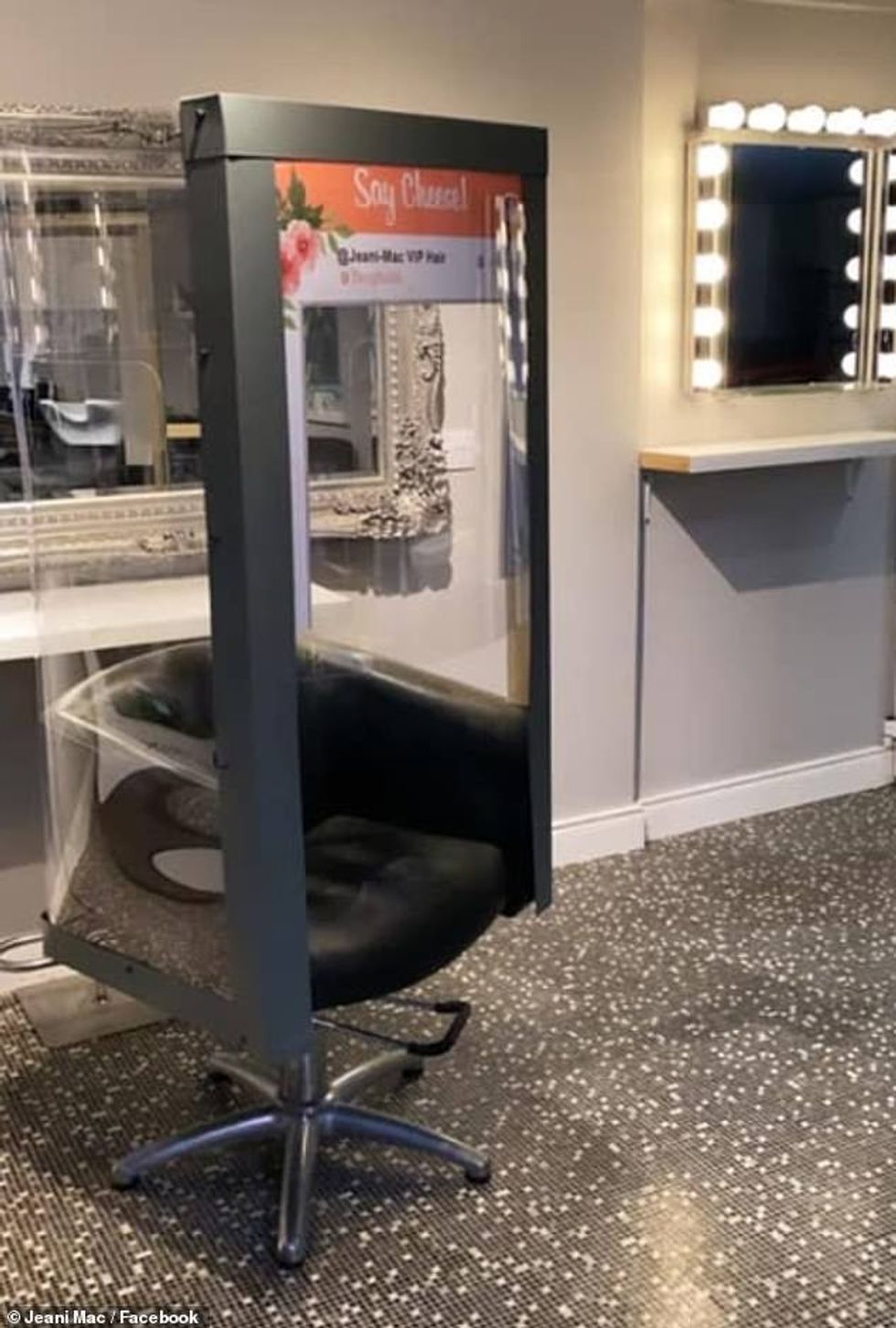 The chair (pictured) is equipped with an anti-bacterial wall and features several gaps so that Jean's gloved hands can treat hair with very little contact