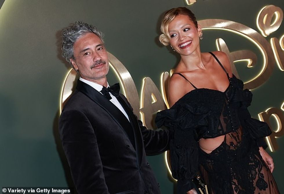 The couple looked in great spirits as they beamed together in snaps