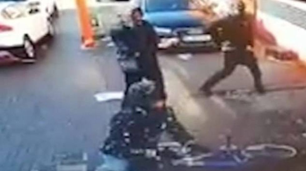 The gang are pictured in Handsworth, Birmingham, where they fired guns outside a chicken shop in the West Midlands