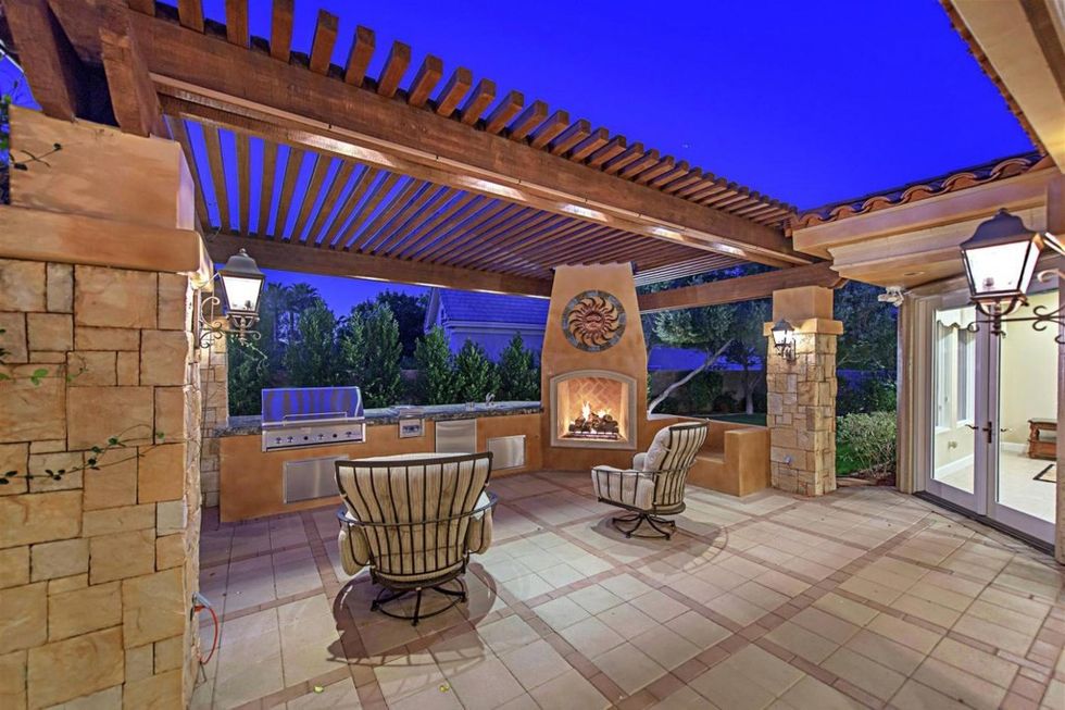 The outdoor kitchen and patio.