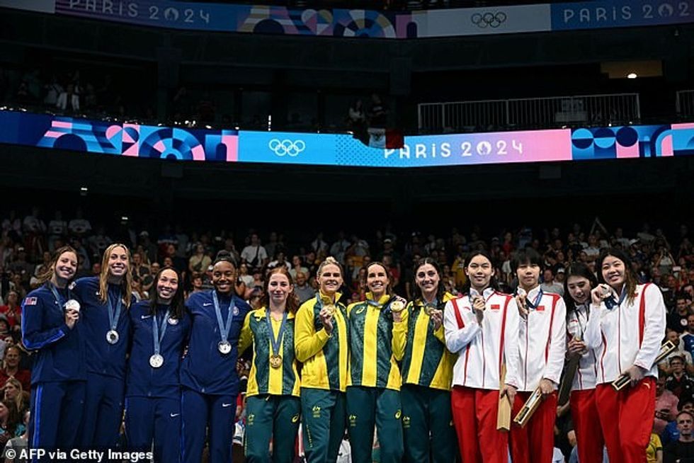 The star certainly seemed in high spirits as he was seen smiling widely throughout - although that could have been to do with the fact the US came second, bringing home the silver medal
