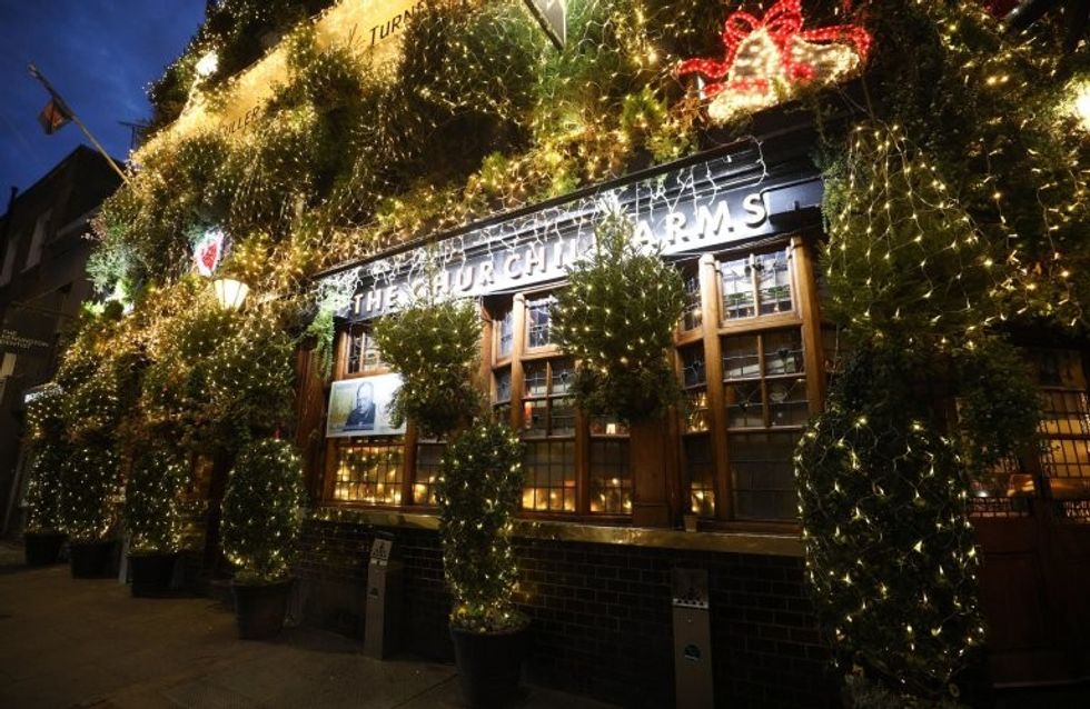 The stunning Churchill Arms pub in Kensington, London which is lit up with 85 Christmas trees, December 7 2016. The famous pub, near to Notting Hill Gate, has used flowers and plants all year round attract punters for nearly 30 years.