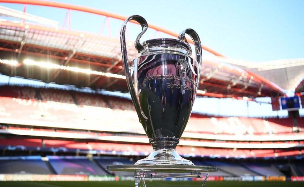the uefa champions league trophy is seen on the pitch xgettyx 242310155