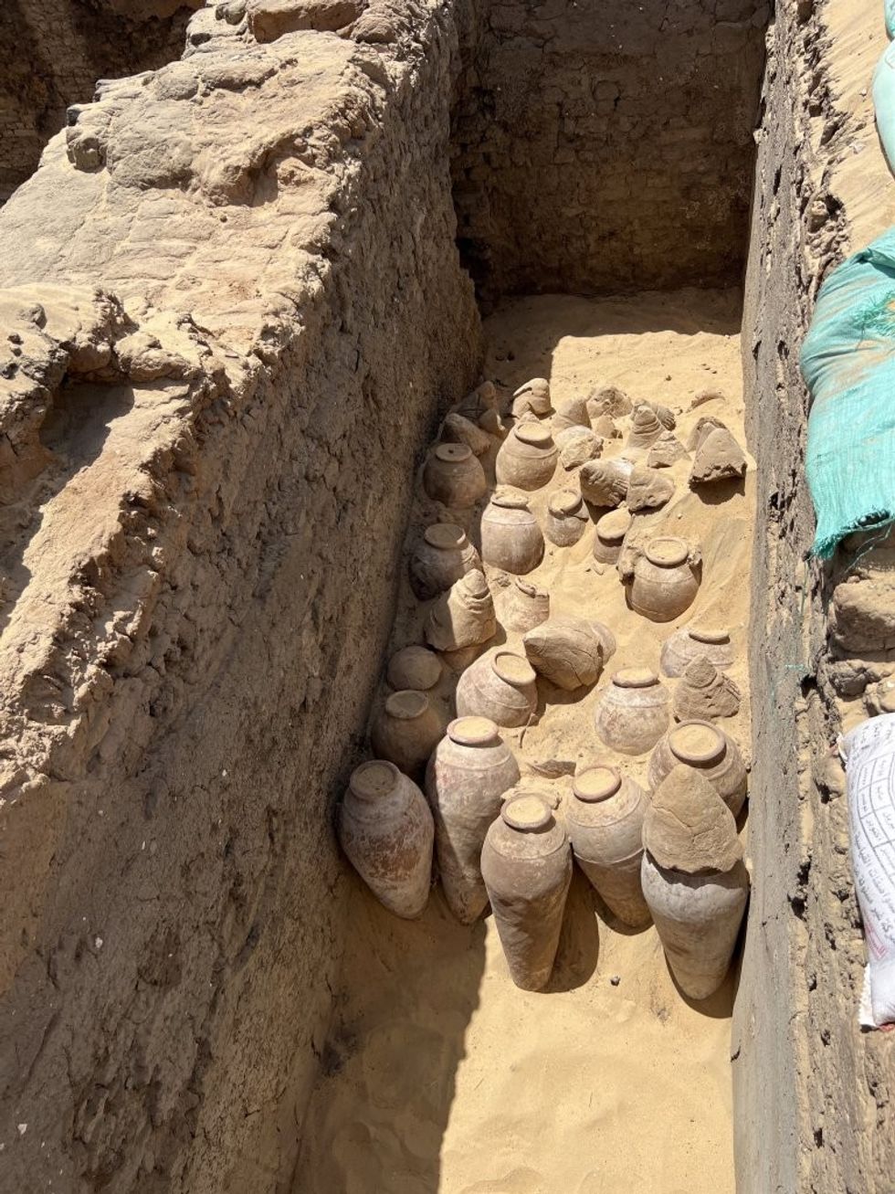 These are the 5000-year-old wine jars — some are still sealed.