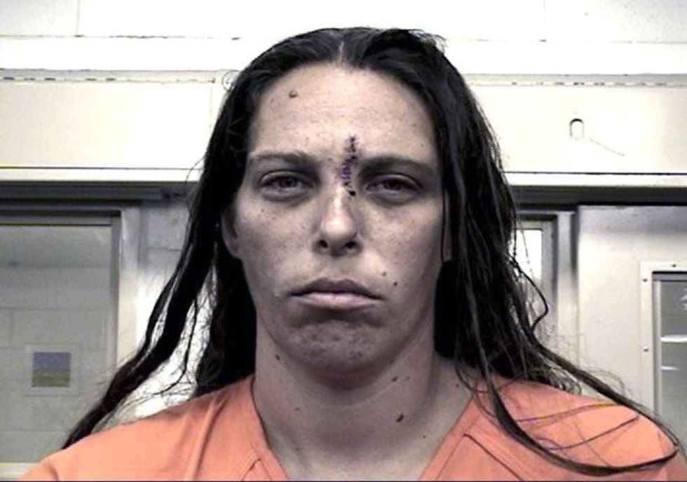 This Aug. 25, 2016 booking photo provided by the Metropolitan Detention Center shows Michelle Martens. New Mexico Gov. Susana Martinez says what happened to the little girl