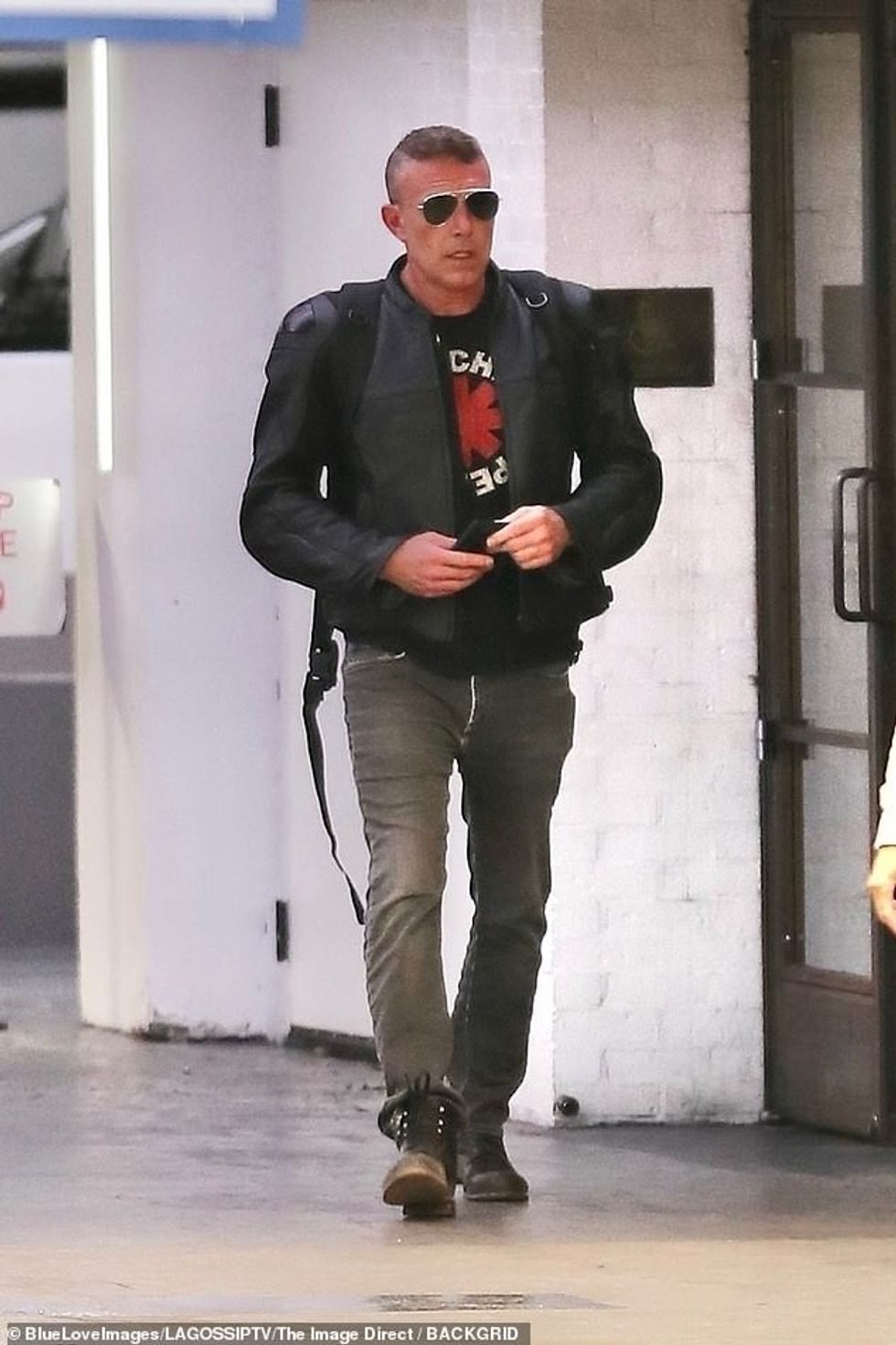 This marks the first time the star has completely ditched her wedding bands - after Affleck showed off his own ring-free hand while debuting a midlife crisis makeover of a faux hawk and rocker tee on Saturday