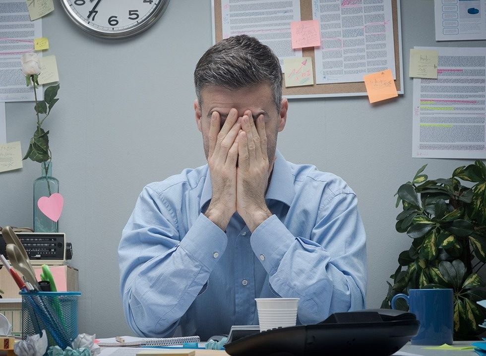 tired man in office