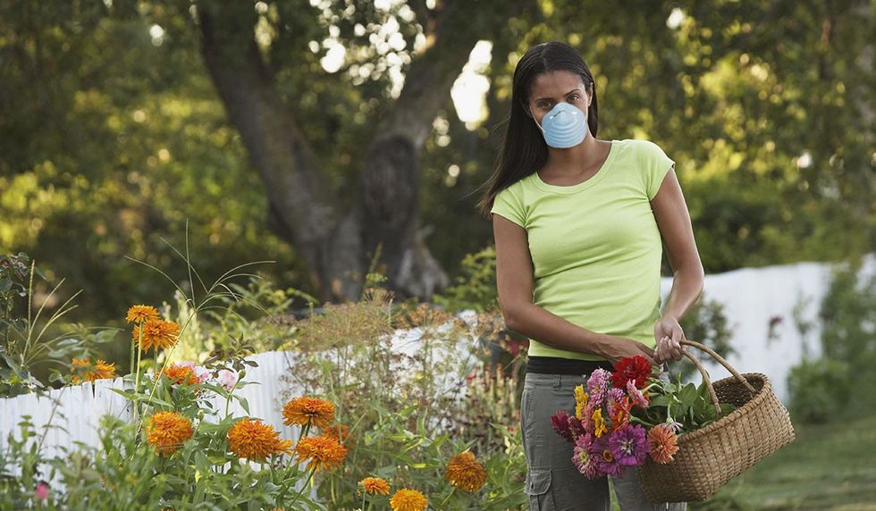 trendy woman wearing a surgical face mask picture id1218933388 0 1