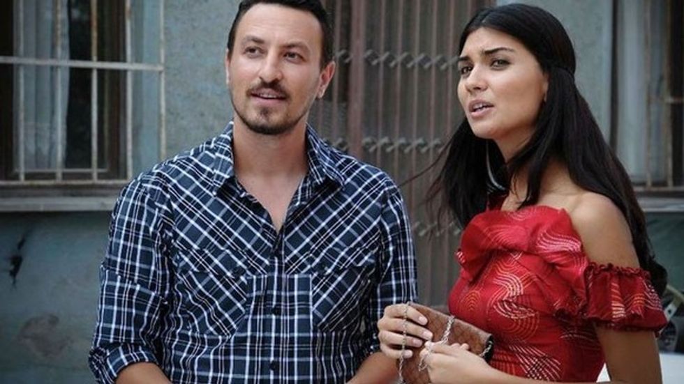 TUBA BÜYÜKÜSTÜN ONUR SAYLAK