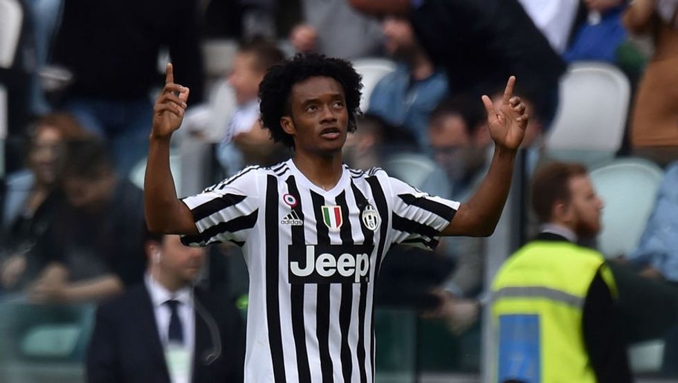 TURIN, ITALY - APRIL 17: Juan Cuadrado of Juventus celebrates after scoring his team's third goal during the Serie A match between Juventus FC and US Citta di Palermo at Juventus Arena on April 17, 2016 in Turin, Italy. (Photo by Tullio M. Puglia/Getty Images)