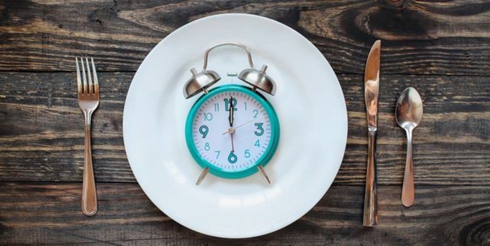 twelve hour intermittent fasting time concept with royalty free image 1572215159