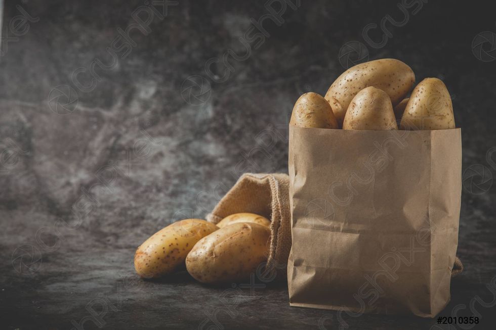 two sacks full potatoes on 2010358