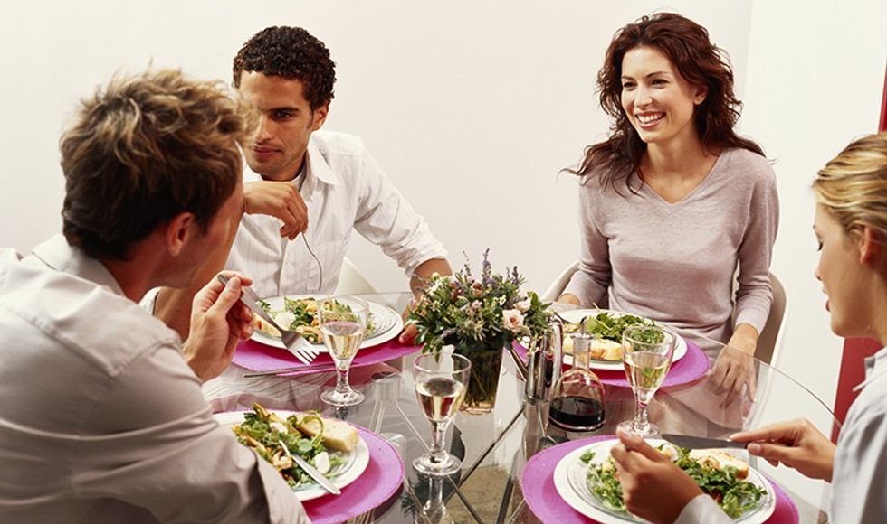 Two young couple dining at restaurant
