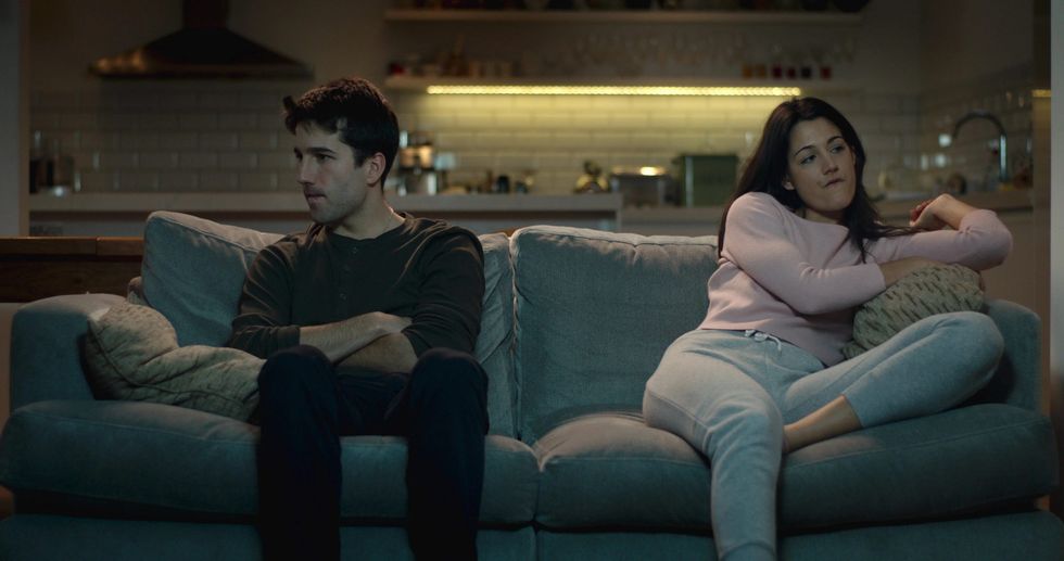 unhappy couple sofa sit apart 087730928 prevstill scaled