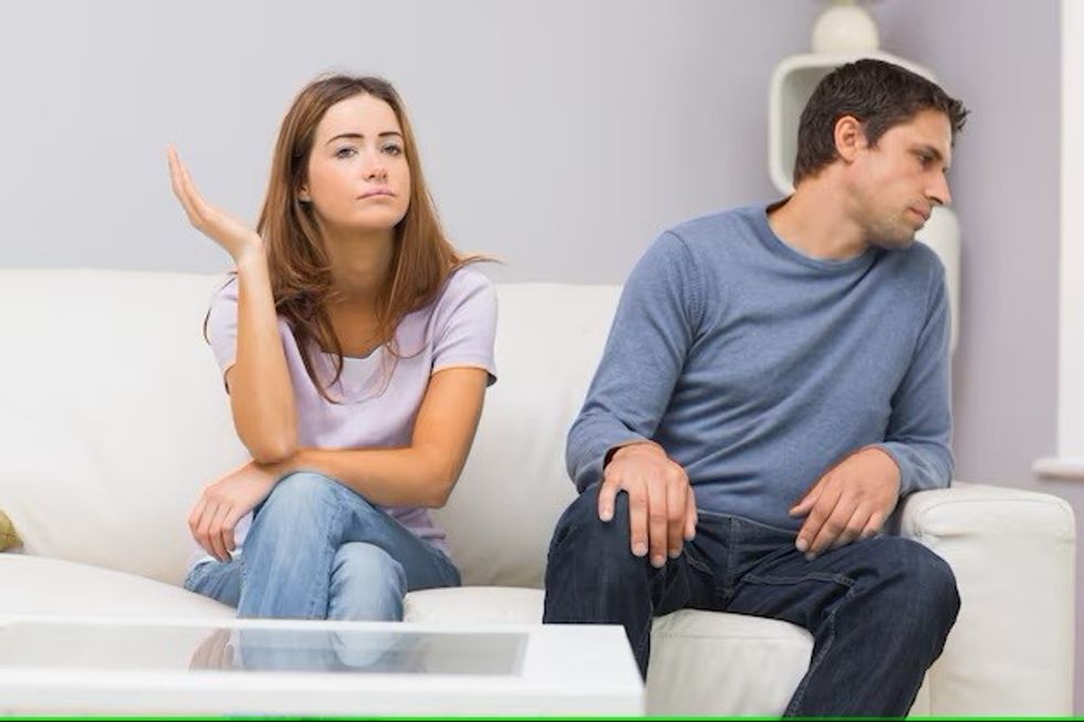unhappy couple talking after argument home 13339 215056
