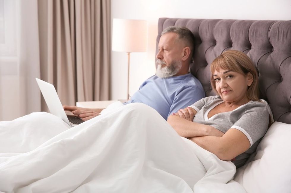 unhappy middle aged couple bedroom home 199352 82