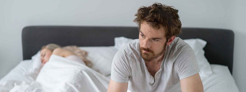 Unhappy Sleeping Couple 594015680 compressed