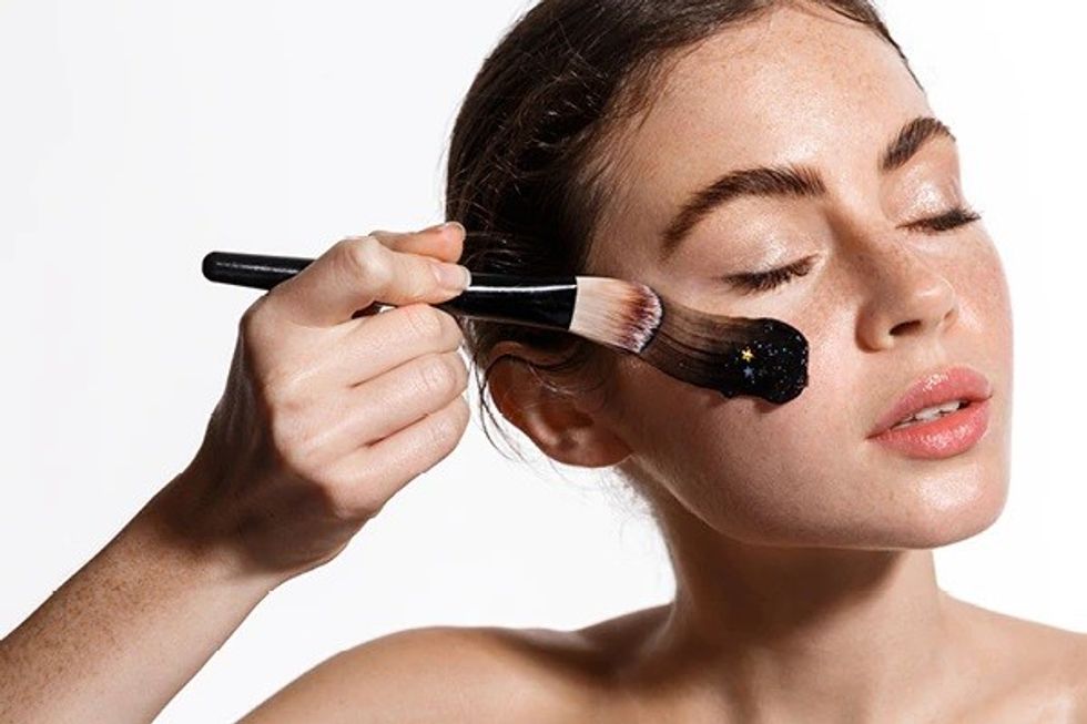 using skincare products with a brush 1