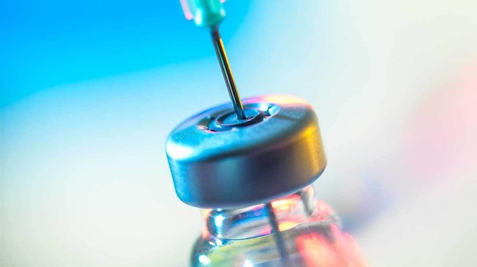 vaccine needle header