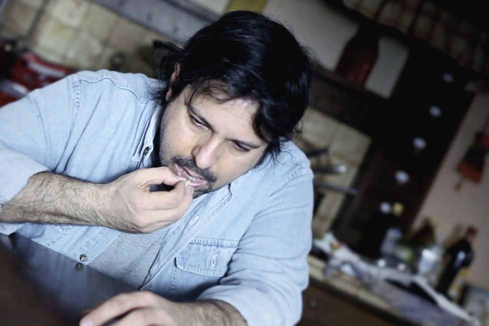 videoblocks pill man dutch angle depressed a depressed sad man taking pills with a glass