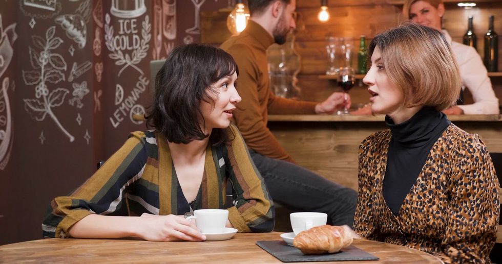 videoblocks two women having a pleasant conve edited