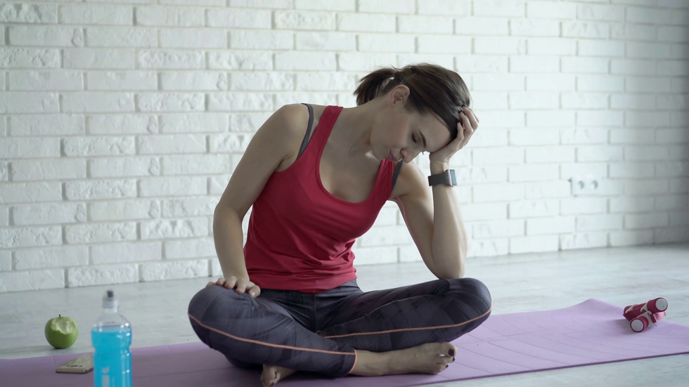 videoblocks young tired woman having shoulder pain af