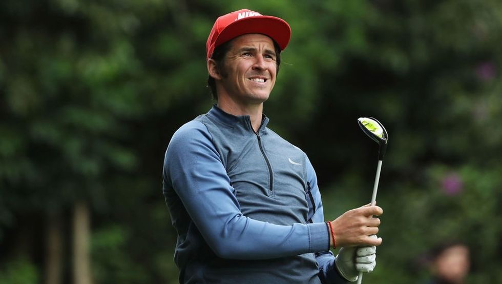 VIRGINIA WATER, ENGLAND - MAY 25: Footballer Joey Barton looks on during the Pro-Am prior to the BMW PGA Championship at Wentworth on May 25, 2016 in Virginia Water, England. (Photo by David Cannon/Getty Images)