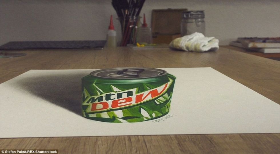 Vizatimet tredimensionale që duket sikur kanë dalë nga sipërfaqja foto 11