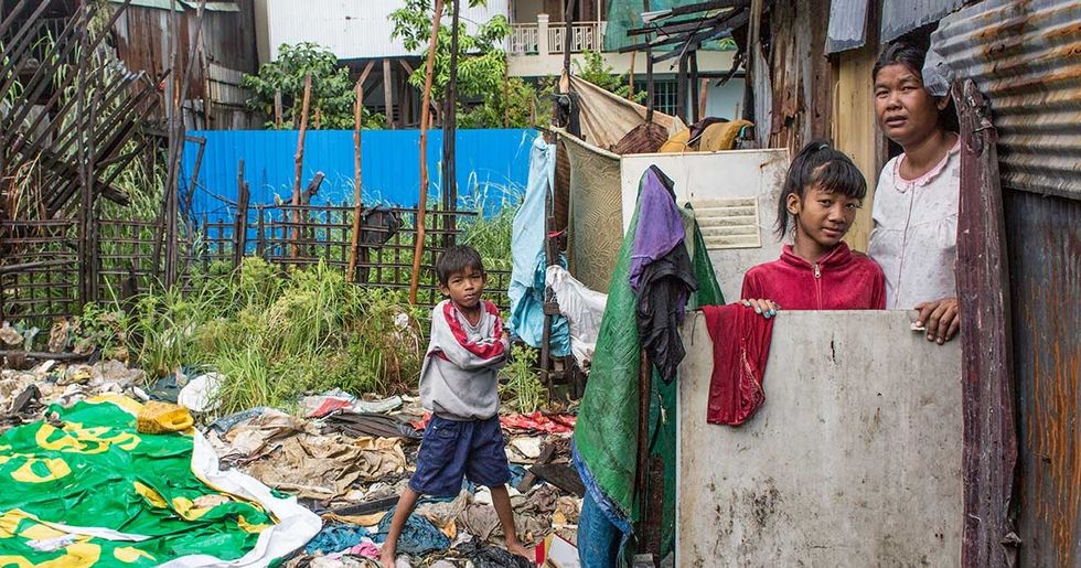 what is informal settlement slum housing crisis