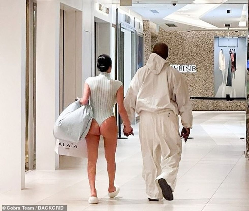 While in Tokyo, Censori shocked as she flaunted her backside during the outing in a ribbed cream G-string leotard as she walked through a public shopping mall with West, 47