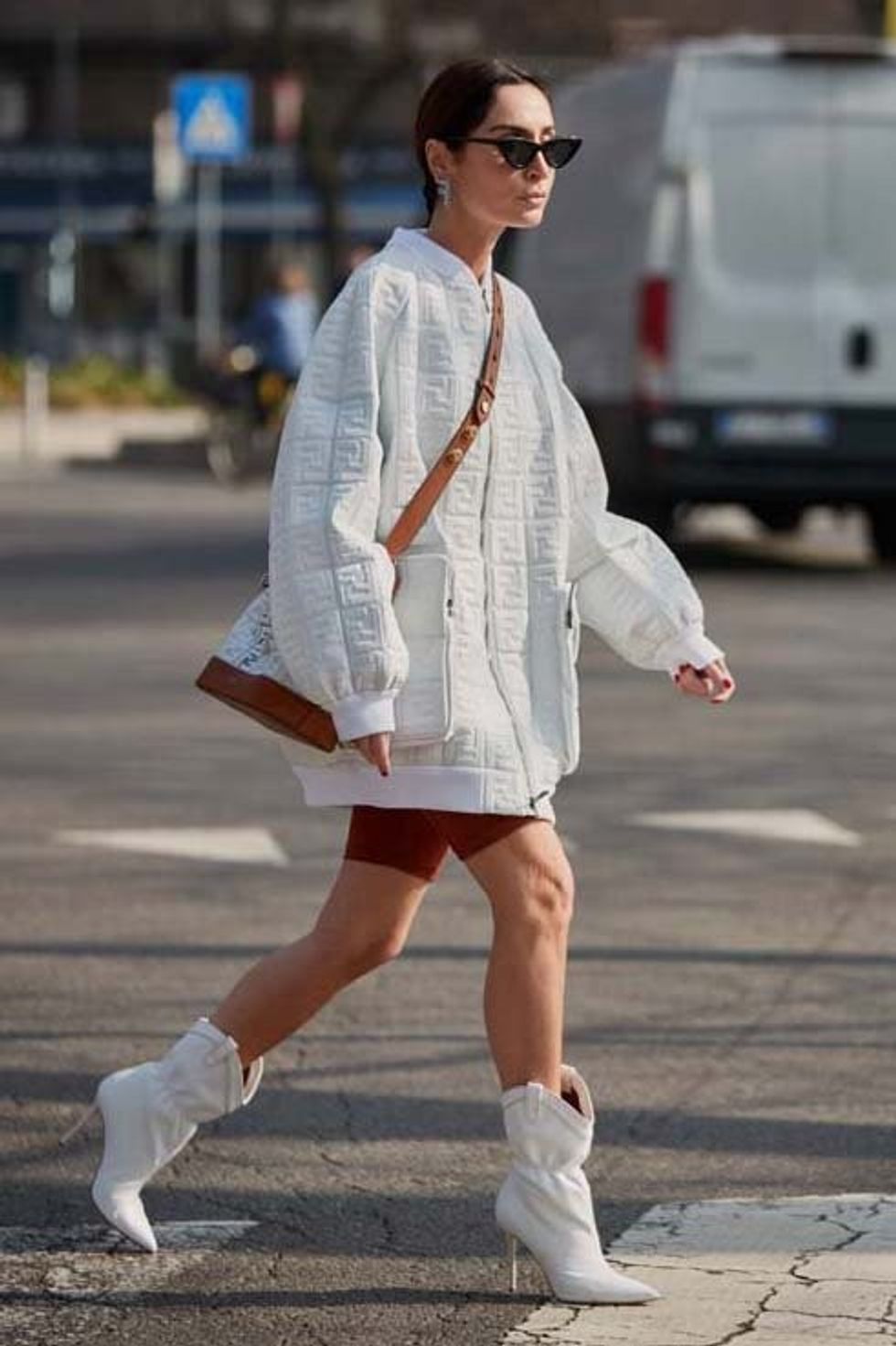 white jacket bomber oversized white shoe booties cowboy brun sun cognac bag shorts cycling fall winter dinner