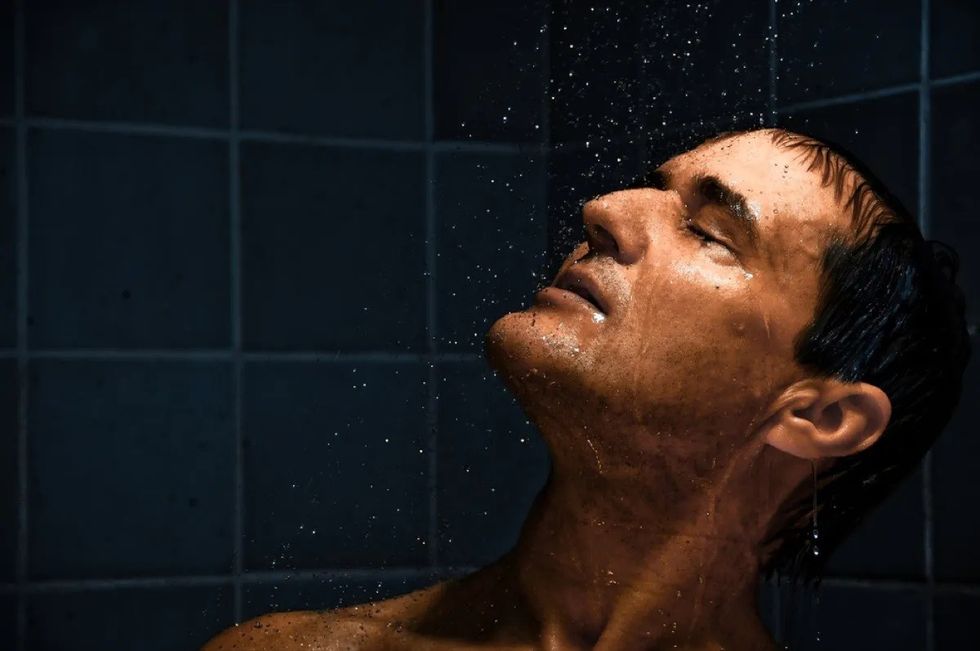 white man in shower