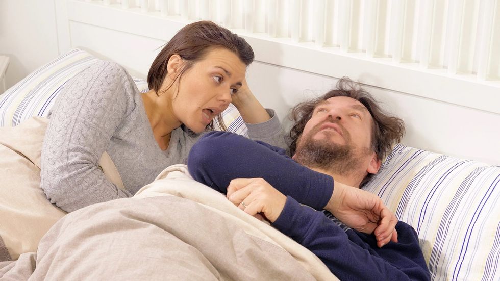 wife and husband talking bed footage 084841244 prevstill scaled