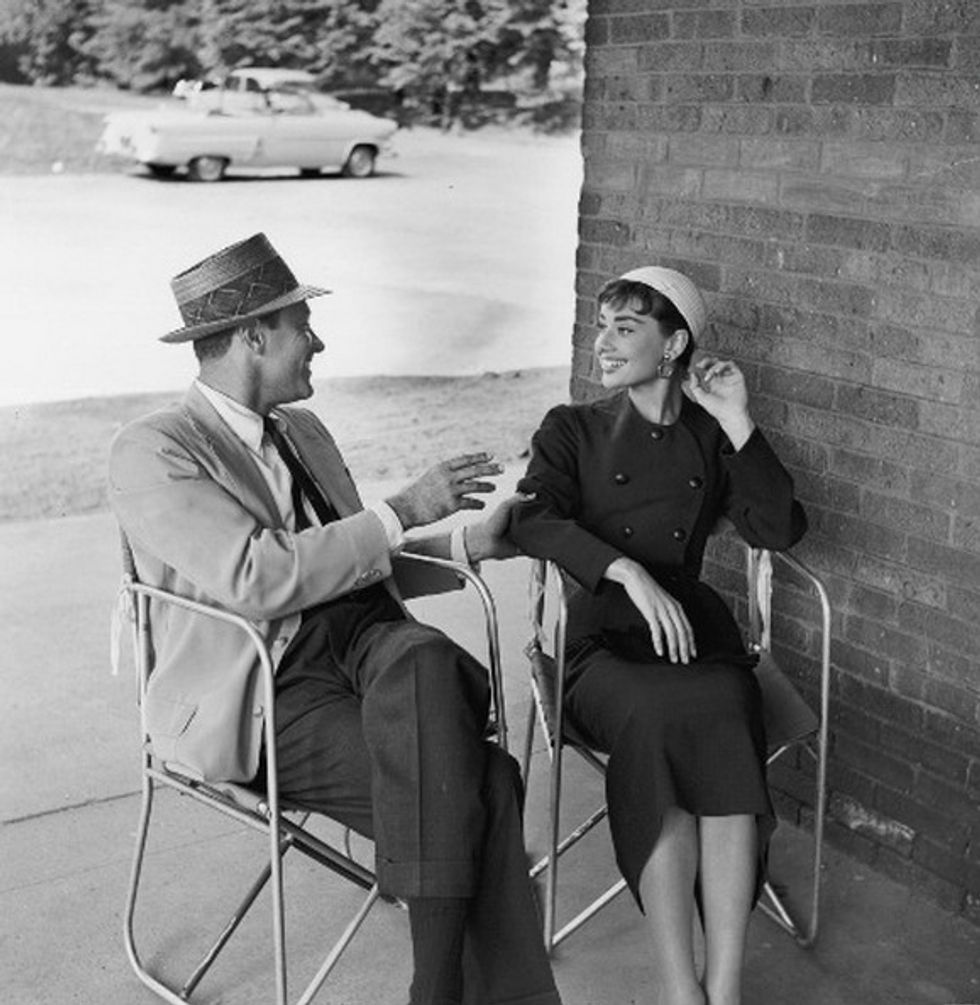 William Holden and Audrey Hepburn on the set of Sabrina 1945