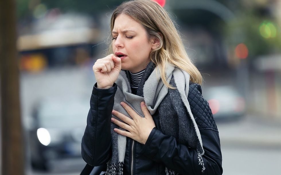 woman coughing FTR 1