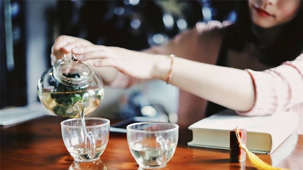 woman drinking tea health benefits of tea