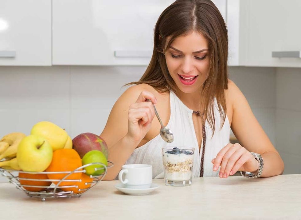 woman eating fruit