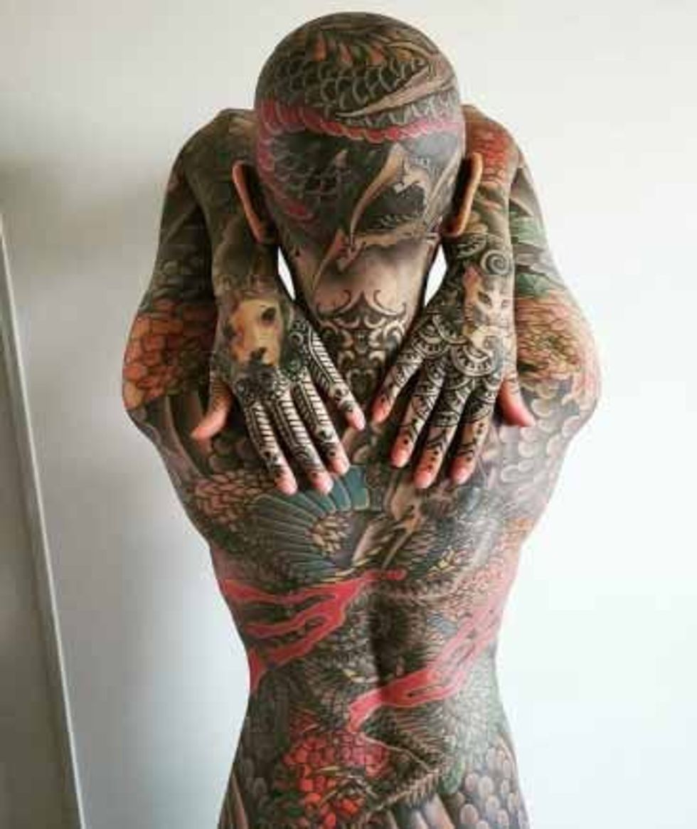 woman gets tattooed from head to toe including genitals spends almost 270004