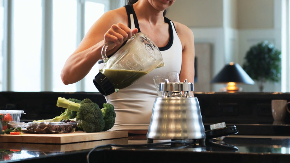 woman in the kitchen making a