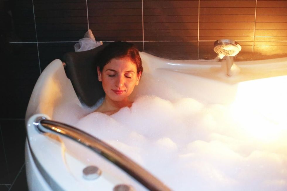 woman relaxing in hot tub