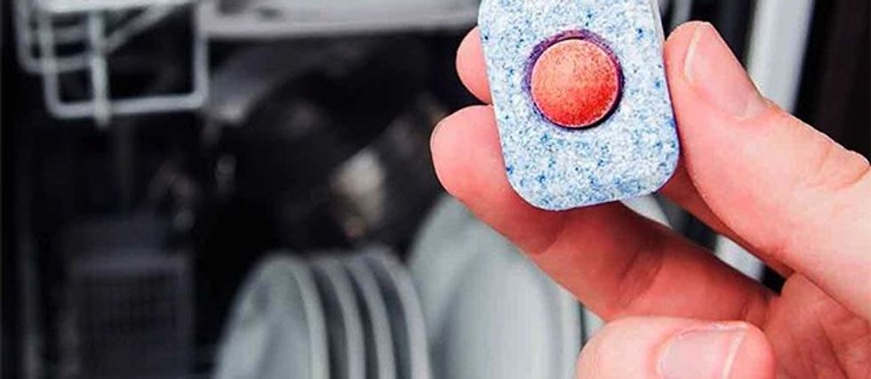 woman-setting-dishwasher